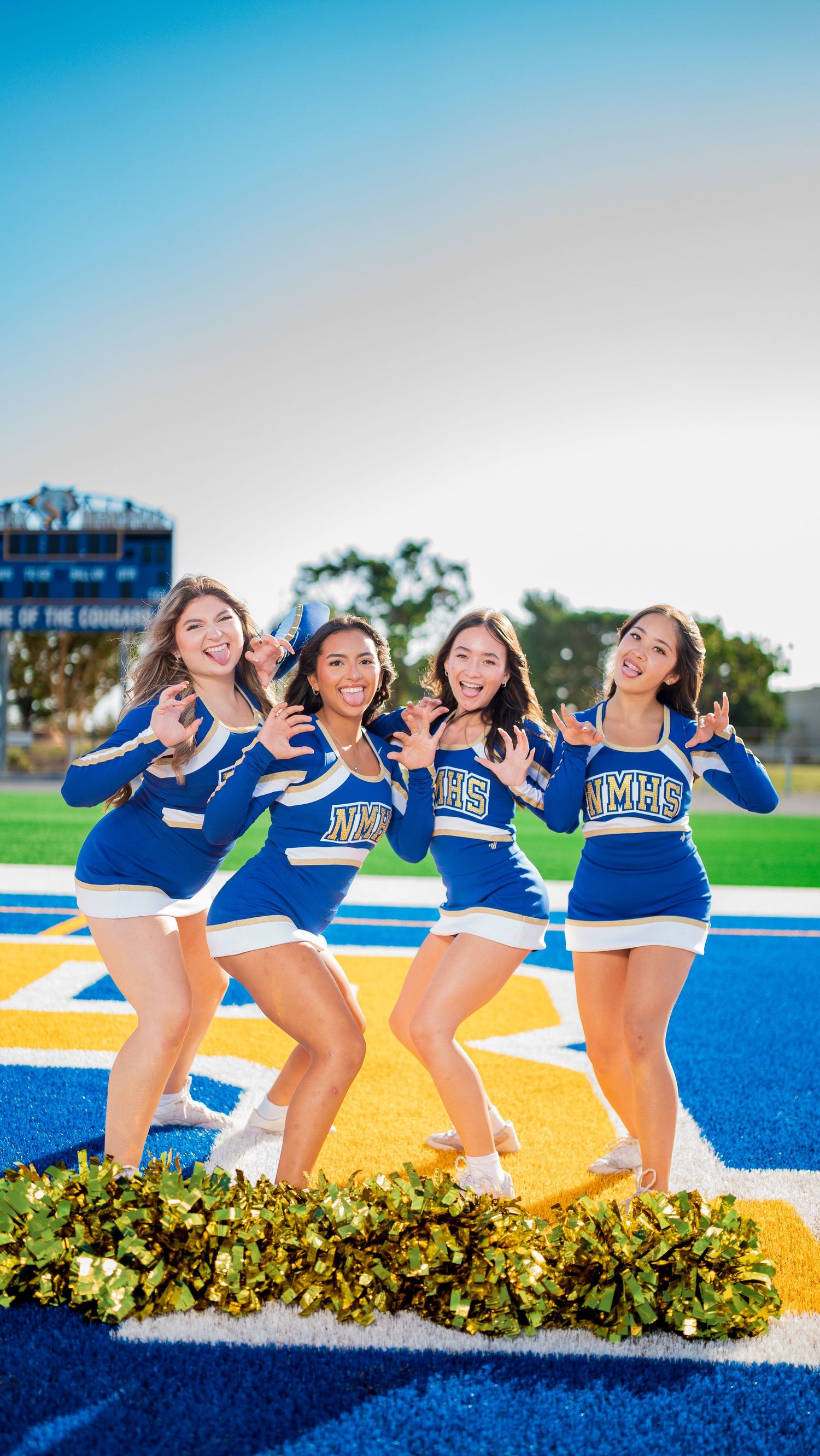 Cheer athletes laughing together during a RAWphotoz media day